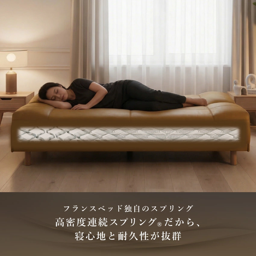 フランスベッド ソファベッド バレンの上で男性が座って新聞を読んでいる画像